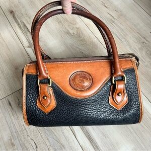 Vintage Dooney & Bourke Classic Black and Tan all weather Leather